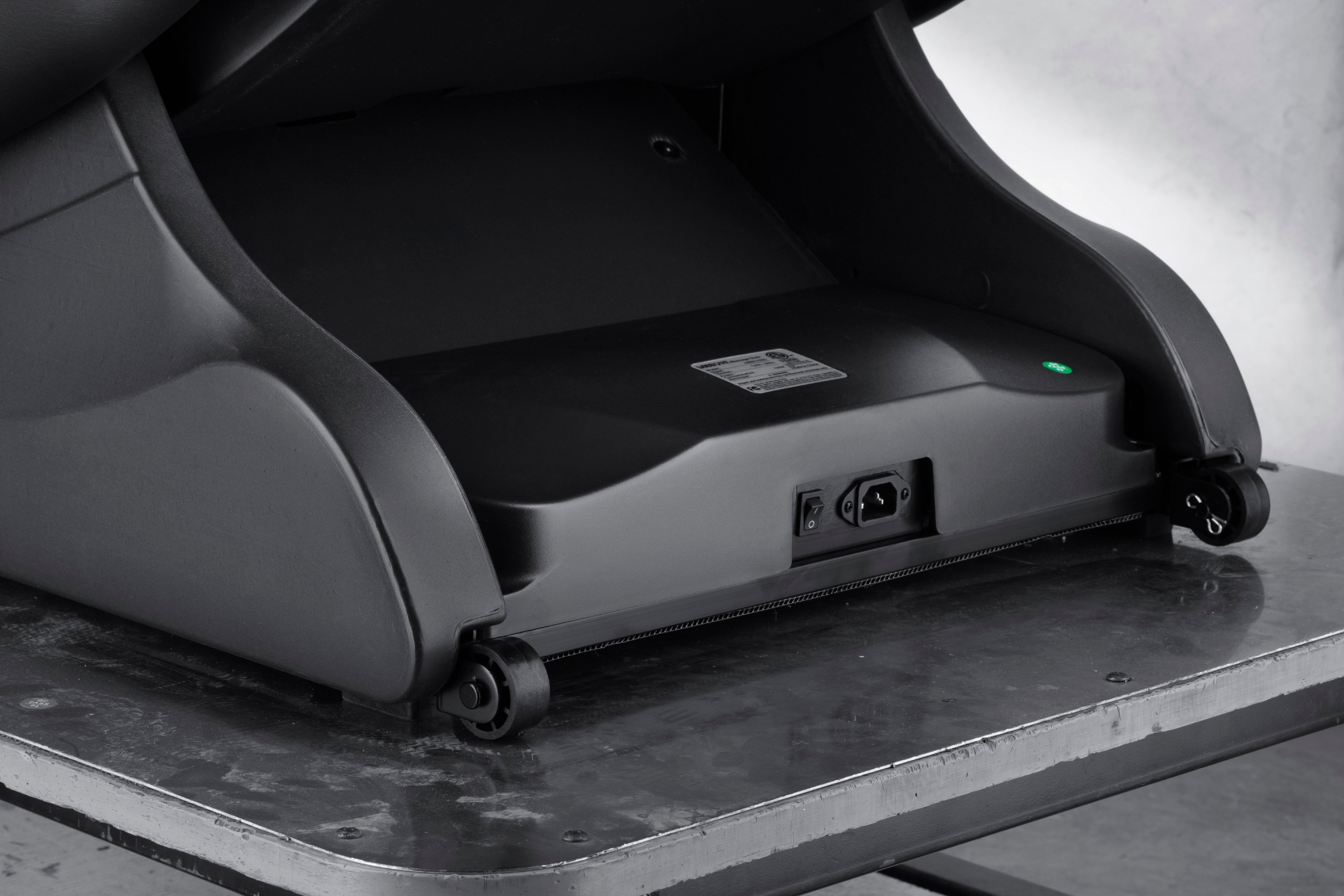 Durable base and easy-move wheels of the BossCare GR8013 massage chair for flexible placement in USA offices.