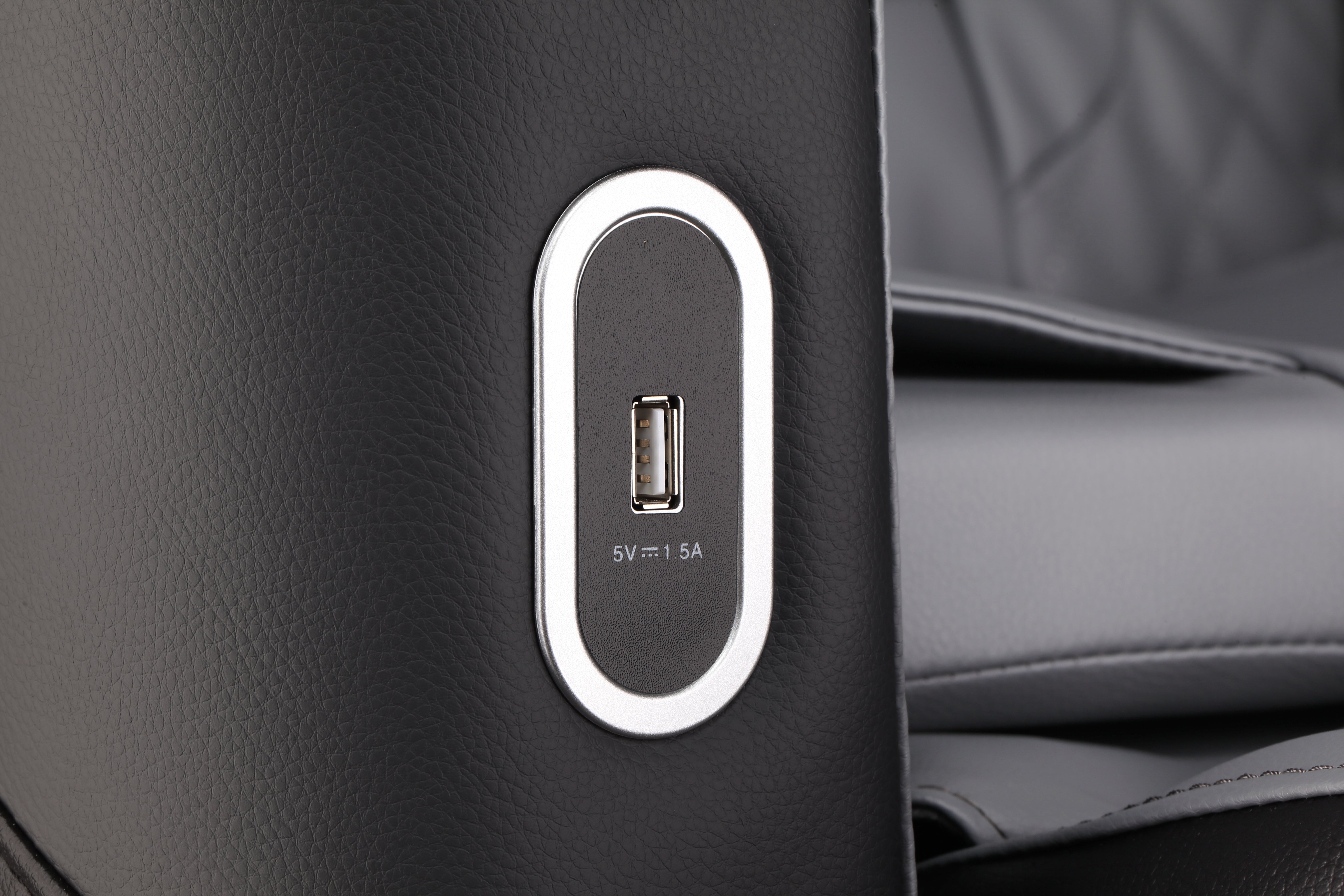 Built-in USB charging port on BossCare GR8013 massage chair for charging devices during relaxation.