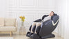 A user experiencing deep-tissue relaxation in a BossCare GR8012 massage chair; showing the 3-level zero gravity reclining position, immersive audio music sync, and ergonomic shoulder airbags.